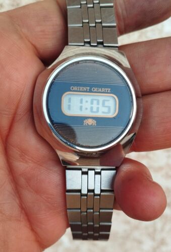 Rare asymmetrical ORIENT early digital model blue screen working well. Video