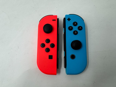 Nintendo Switch / OLED Joy-Con - L&R Neon Red /Neon BlueJoy Con HAC-015/HAC-016