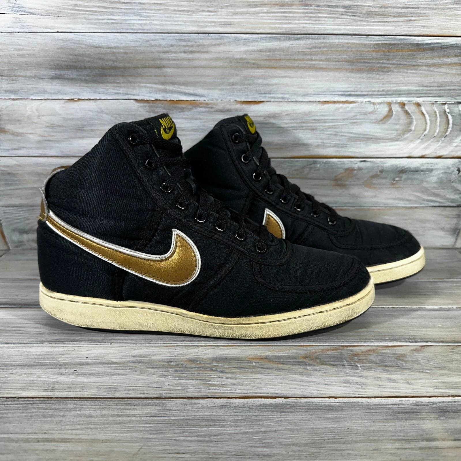 Baskets homme vintage Nike Vandal High Supreme noir métallisé or