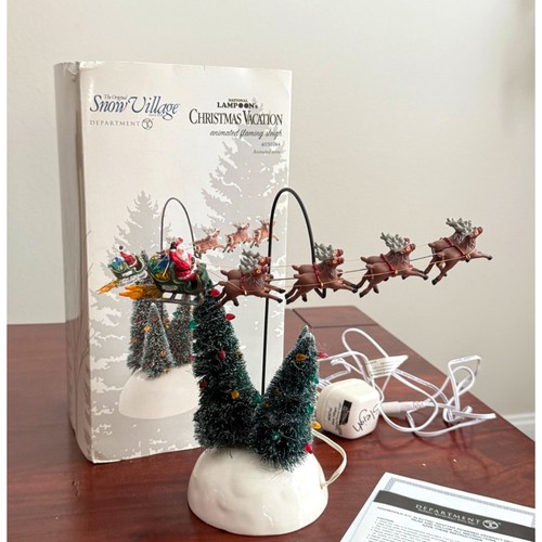 Department 56 National Lampoons Christmas Vacation animierter Flammenschlitten 
