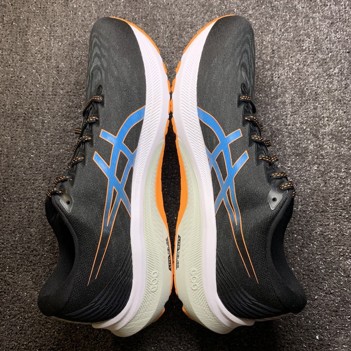 ASICS GT-2000 11 men's size 11.5 med Black/Sun Peach