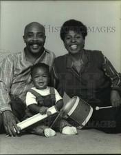 1985 Press Photo Baby Miles joins Sesame Street hosts 
