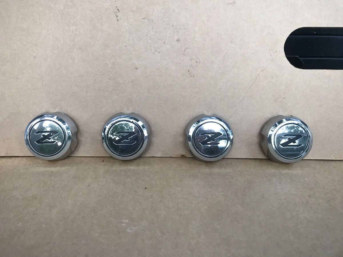 Nissan Datsun 280ZX 40343 P0000 OEM Center Wheel Cap Rim Cover Chrome XY (EACH) Nissan Datsun 280ZX 40343 P0000 OEM Center Wheel Cap Rim Cover Chrome XY (EACH)