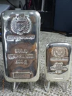 22.857 oz germania mint silver slab pours, sealed and boxed