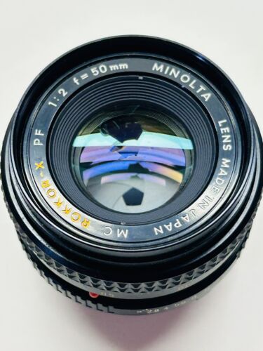 Lente estándar Minolta MC Rokkor-X PF 50 mm f/2 casi nueva con tapas - Imagen 6 de 6