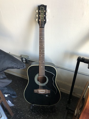 1980s Eko E-20 black dreadnaught - has hole damage - perfectly playable as is