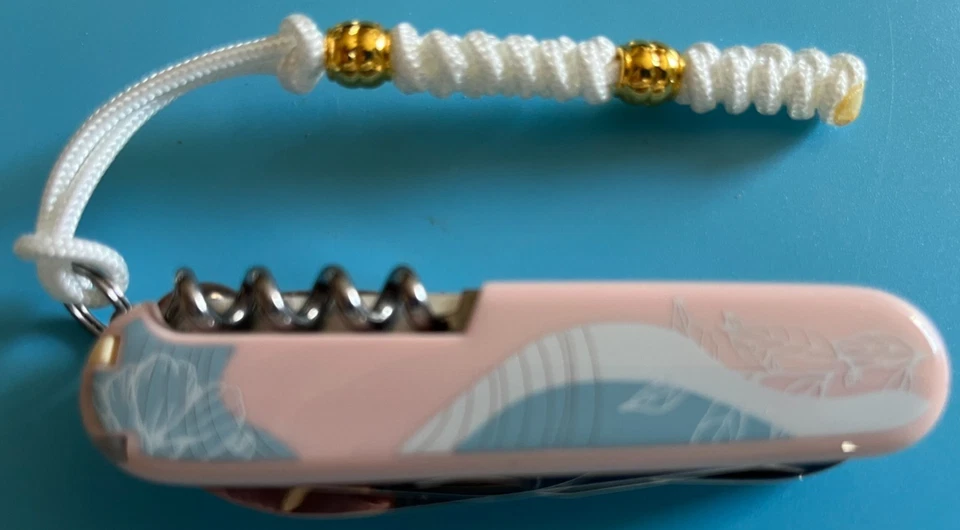 Diseño Victorinox Paris, con bolígrafo y cordón blanco/oro, 91 mm, diseño de color Foto 4 de 4