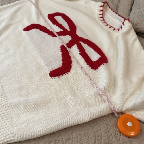 Weißer Weihnachtspullover mit Schleife XL - Bild 9 von 12
