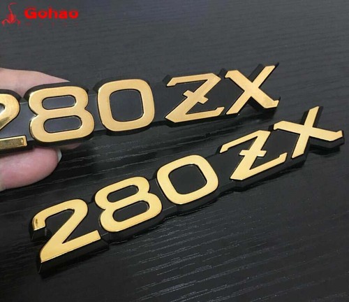 OEM Gold Datsun 280 280ZX Fender Side Emblem Symbol Logo Badges Pair L/R - Picture 2 of 3