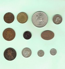11 ITEMS OLD TOKENS & COINS SOME SILVER inc A 1916 SILVER ONE SHILLING COIN.