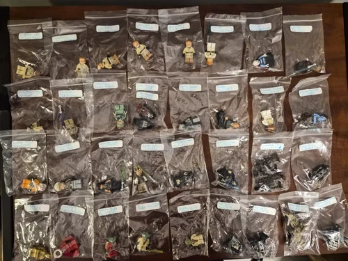 Lego star wars minifigure collection with accessories and storage container