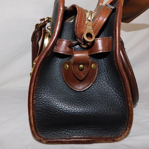 Bolso de mano vintage Dooney and Bourke de cuero marrón oscuro con hebilla - Imagen 14 de 15