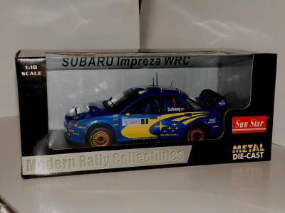 ミニカー Sun Star Rally Collectibles Subaru 1:18 s-l1200.jpg