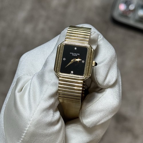 Patek Philippe Ref. 4429/1J • Solid 18K Yellow Gold • Black Onyx Diamond Dial