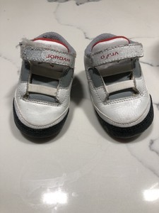 red and black infant jordans