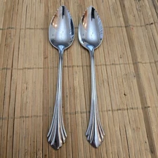 2  ONEIDA REMBRANDT GLOSSY STAINLESS GRAPEFRUIT SPOONS