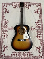 Vintage Stella Harmony Acoustic Guitar with Hard Case and Strap. Good Condition.