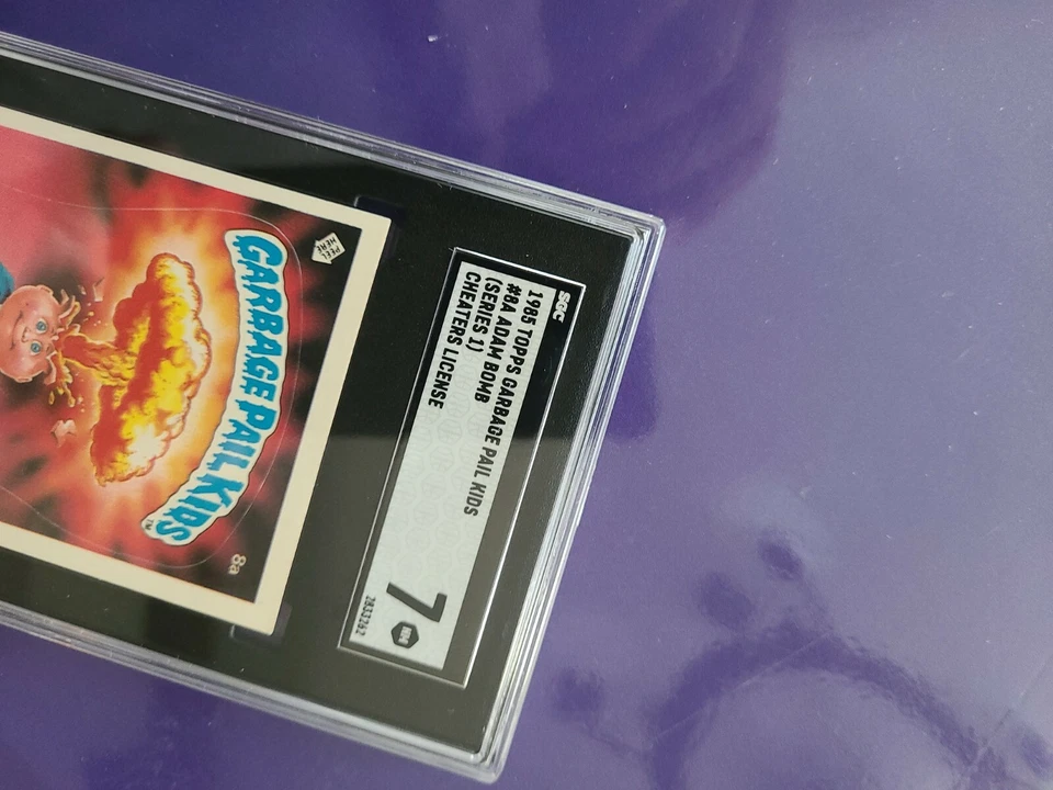 1985 Original Series 1 - 8a -Adam Bomb Garbage Pail Kids Cheaters PSA 7 NM Matte - Image 2 of 4