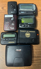 Vintage Motorola and Sun Telecom pagers for parts not working