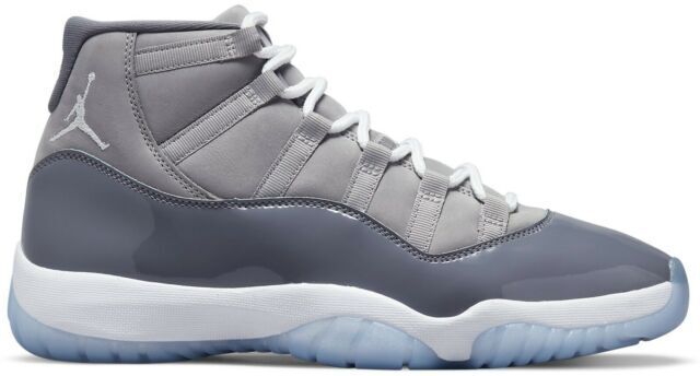 gray and white jordan 11