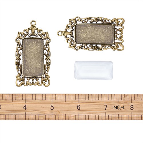 Set 6 pendenti in lega tibetana lunetta rettangolare filigrana e coperchi 38x19 mm - Foto 3 di 5