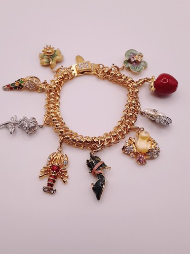 Pulsera vintage firmada Nolan Miller Charm. 8 dijes 7" con caja original - Imagen 4 de 24