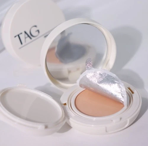 White TAG Skin Fit Cover Balm 12g #01 with separate round silver balm in clear plastic wrapper.