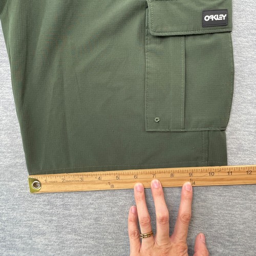 Pantalones Cortos Oakley Hombre 32 Verde B1B Carga Híbrido Cepillo Oscuro Repelente al Agua - Imagen 18 de 19
