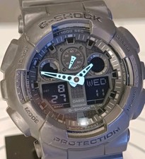Casio G-Shock GA-100 Analog/Digital Watch Black Band, Blue Hands GA-100C