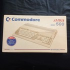 Amiga A500 komputerowy system gier retro w pudełku instrukcje Commodore 