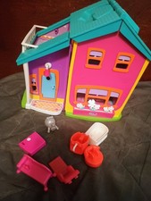 TLC 2002 Polly Pocket casa delle bambole magnetica con alcuni accessori. Così com'è