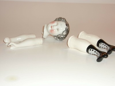 antique china doll heads