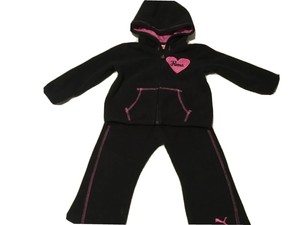 black and pink sweatsuit