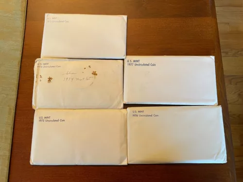 Lot of Five uncirculated US Mint sets in original envelope.  One each 1973-1977