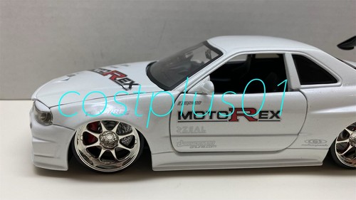 JADA DUB CITY 2002 NISSAN SKYLINE GT R R34 1:24 WHITE MOTOREX - Picture 2 of 12