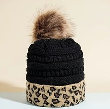 NWT Leopard print winter hat with black and faux fur.