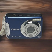 Canon PowerShot A480. Navy blue compact tested and working with cannon case