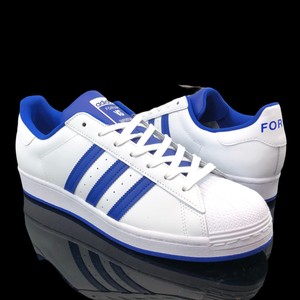 blue and white shell toe adidas