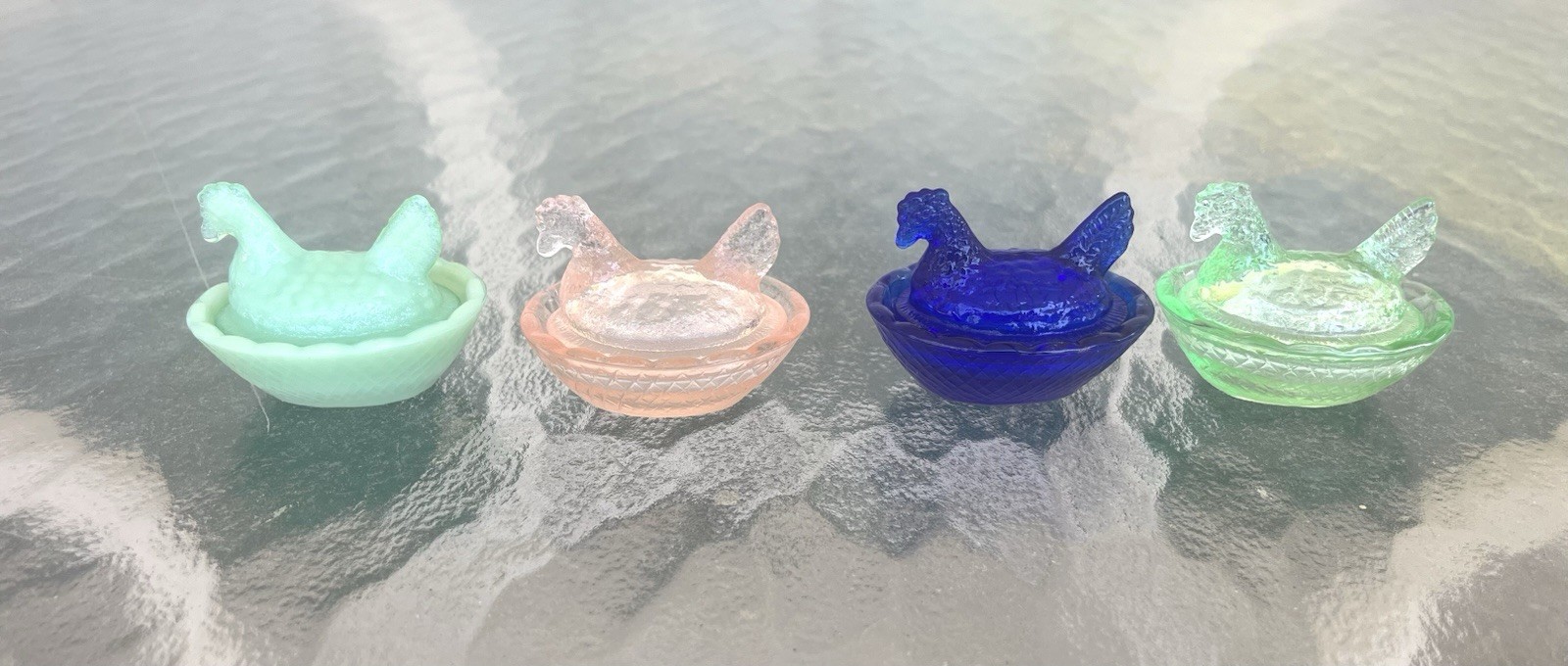 Four Piece Set Vintage Style Glass Mini Hen On Nest Covered Dishes.