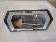 1/64 Custom Pete 385 White Yellow Flames White Bed Rollback Tow Truck SpecCast
