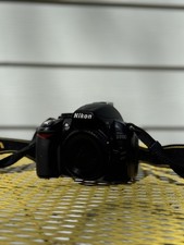 Nikon D3100 DSLR Camera, Body Only with charger & battery & mini tripod