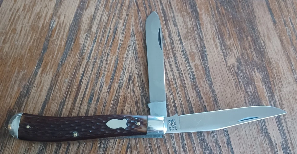 Trampero Schrade Walden 293 3 7/8" Delrin 1095 acero usado Foto 3 de 4