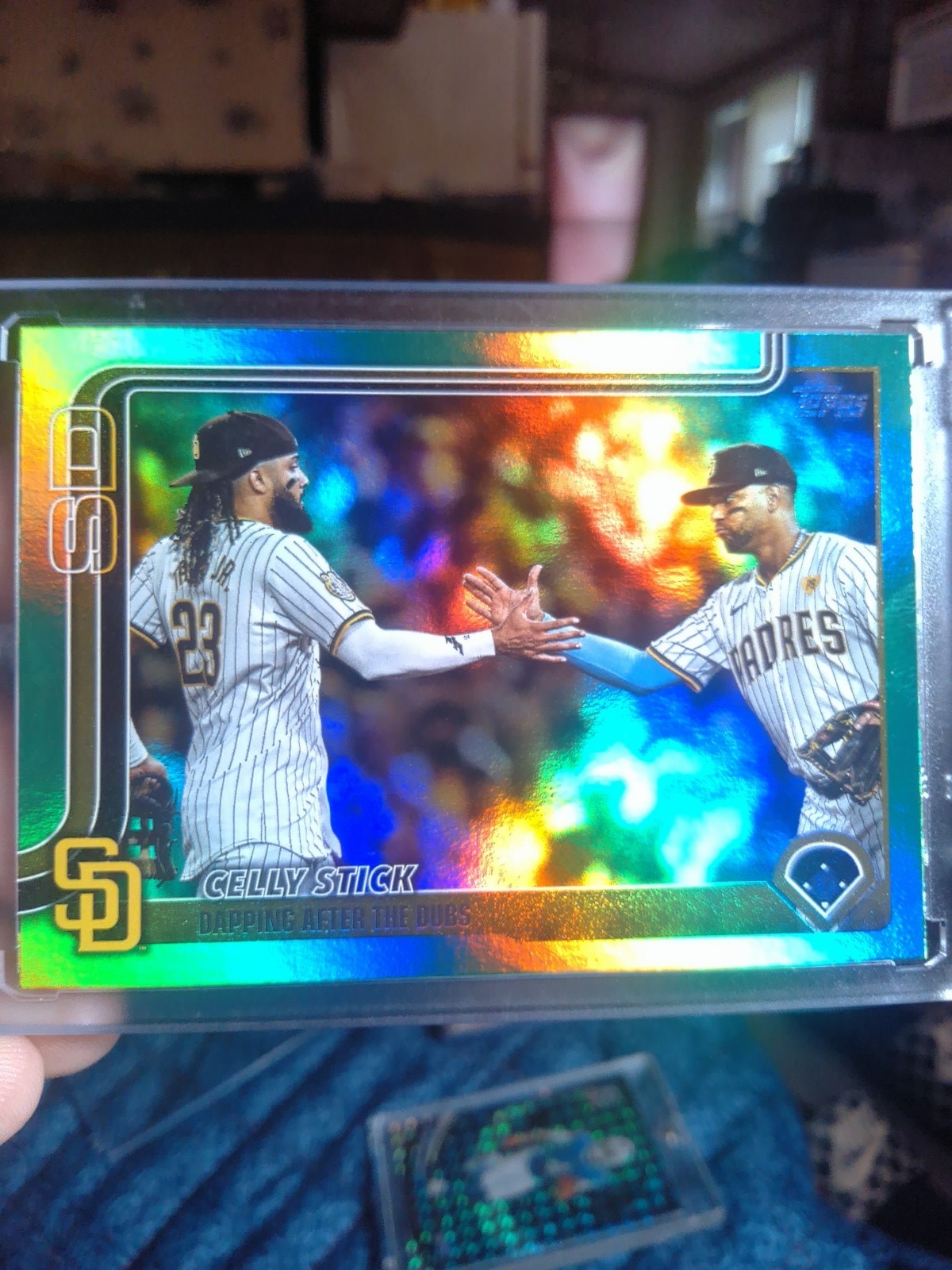 2025 Topps Series 2 Fernando Tatis Jr Celly Stick #389 Green Holofoil /99 Padres