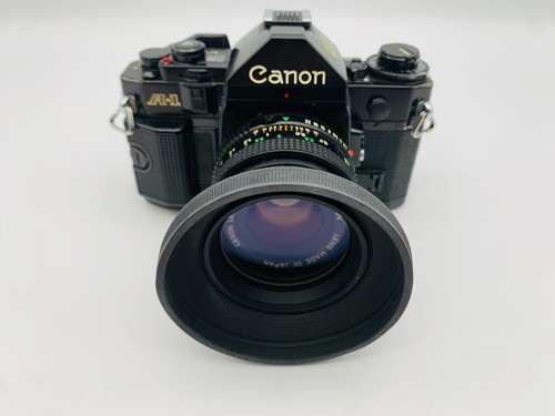Starter set Canon A1 tanti accessori + 2 obiettivi + BDA + custodia + flash e molto altro - Foto 3 di 24