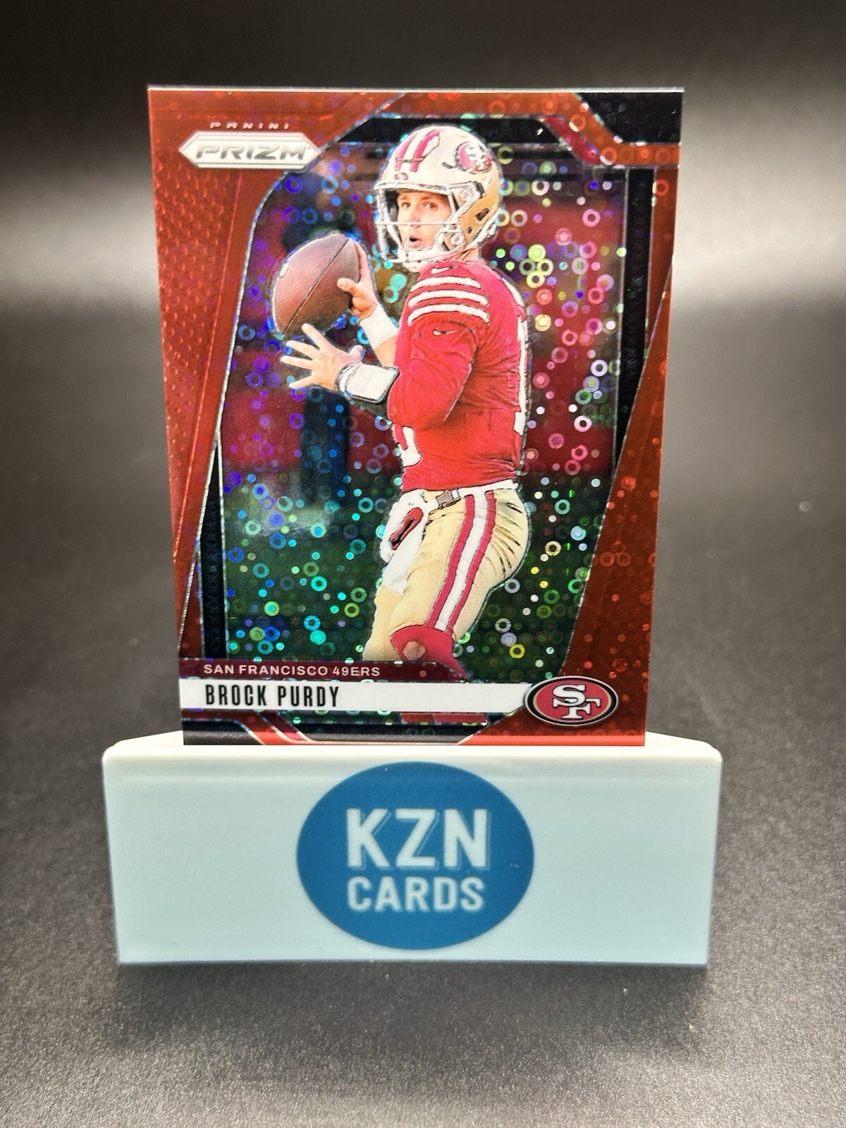 Brock Purdy 2024 Panini Prizm No Huddle #249 Red Disco 24/75 Color Match 49ers