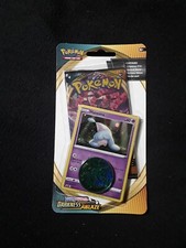 Pokemon blister pack with coin Hatenna Darkness Ablaze. Factory sealed.
