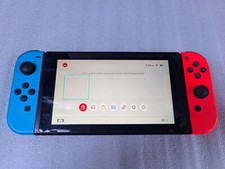 Nintendo Switch Red and Blue used (Fair) HAC-001 With Dock (No charger)