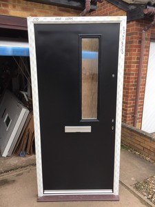 CONTEMPORARY BLACK COMPOSITE FRONT DOOR IN A UPVC WHITE FRAME 1000 X ... CONTEMPORARY BLACK COMPOSITE FRONT DOOR IN A UPVC WHITE FRAME 1000 X ...