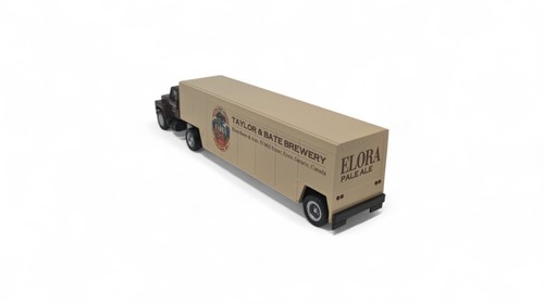 TAYLOR & BATES BREWERY, ELORA BEER, INTERNATIONAL, SEMI TRACTOR TRAILER by Herpa - Picture 7 of 22