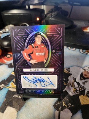 2023 Panini Chronicles Sheldon Creed Obsidian Auto Electric Etch Purple #/49